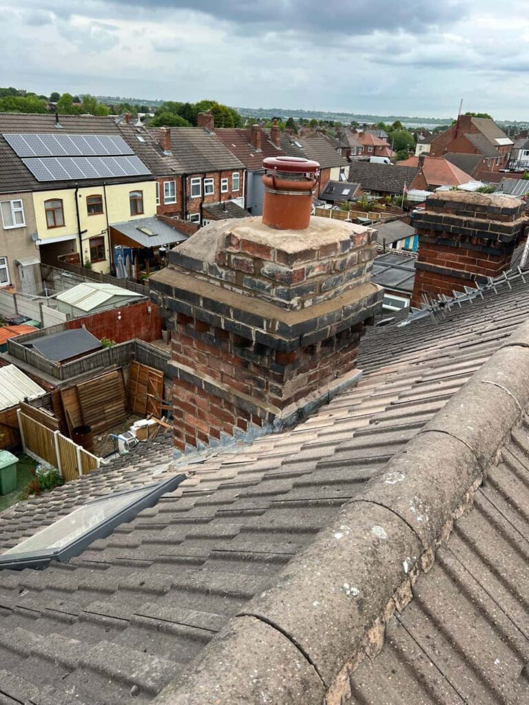 This is a photo taken from a roof which is being repaired by Linton Roofing Repairs, it shows a street of houses, and their roofs